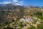 mountain-side spanish-themed home